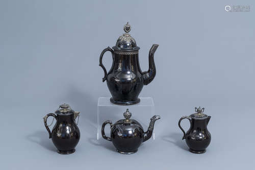 A silver mounted black glazed Namur pottery coffee pot, a te...