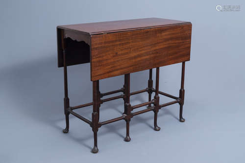 An English George III mahogany spider-leg table by Thomas Ch...