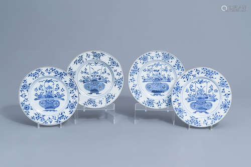 Four large Chinese plates with flower baskets and floral des...