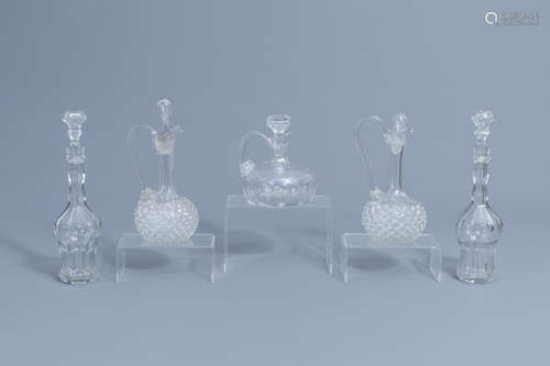 Five glass and crystal carafes, a.o. Verre de Lige, 18th C....