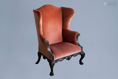 A finely carved English George III mahogany wing armchair, 1...