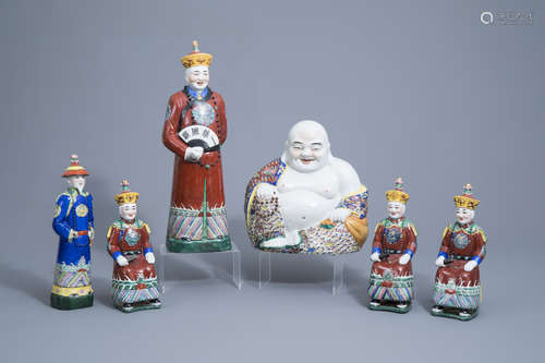 Five Chinese famille rose figures of dignitaries and a seate...