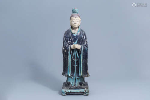 A large Chinese turquoise and aubergine glazed figure of a d...