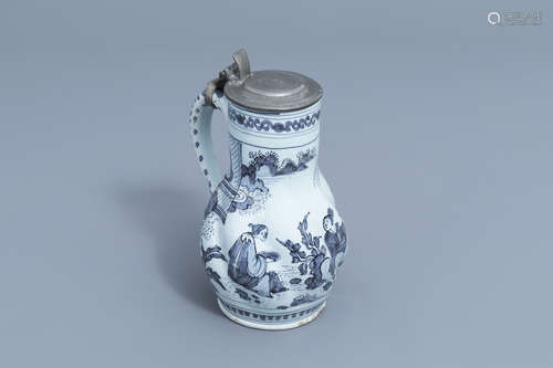 A Dutch Delft blue and white 'chinoiserie' jug with pewter c...