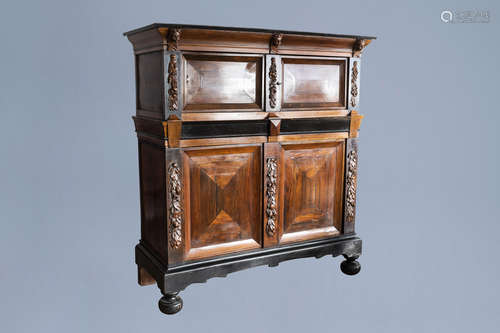 A Dutch wooden four-door cupboard, 17th C. and later