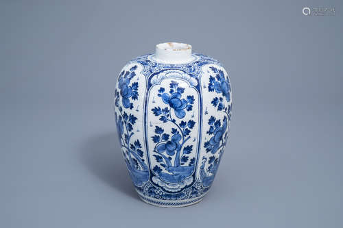 A Dutch Delft blue and white vase with floral design, 18th C...