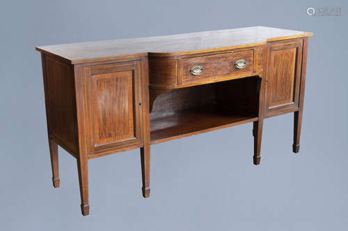 An English George III mahogany sideboard with a drawer over ...