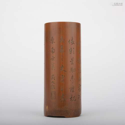 A bamboo 'poems' pen container