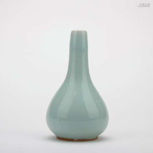 A celadon-glazed vase