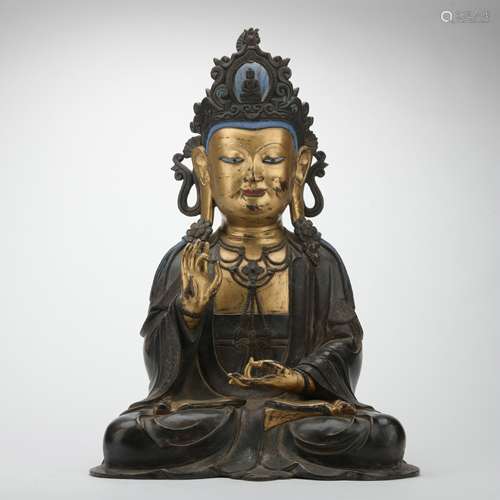 A gilt-bronze statue of Guanyin