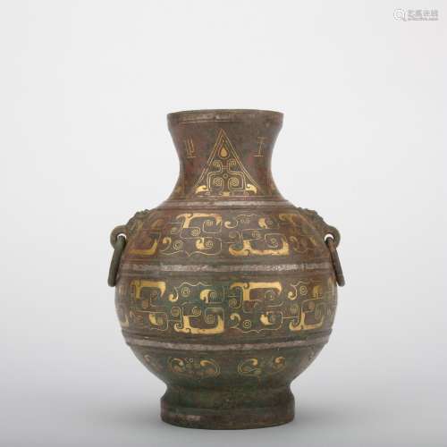 A bronze vase ware with gold and silver