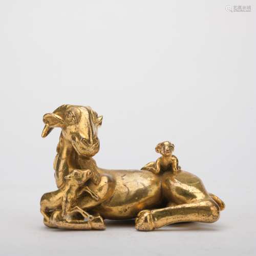 A gilt-bronze sheep