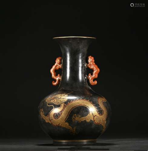 A black glazed vase