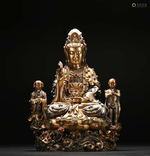 A gilt-bronze statue of Guanyin