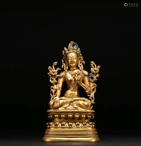 A gilt-bronze statue of Tara