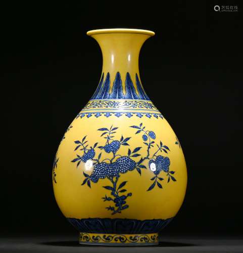 A yellow glazed pear-shaped vase