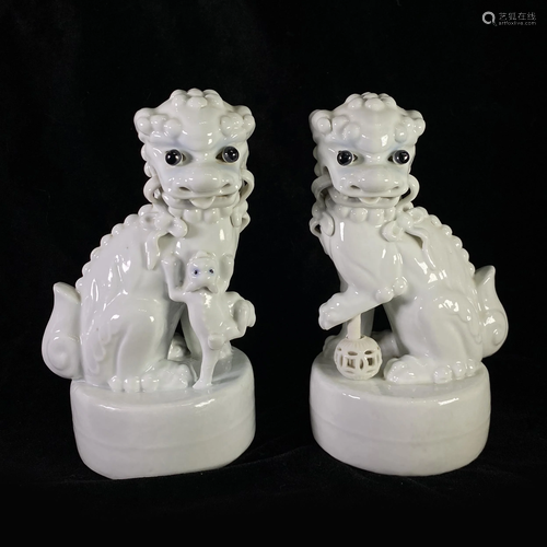 Pair Of White-Glazed Porcelain Foo Lions