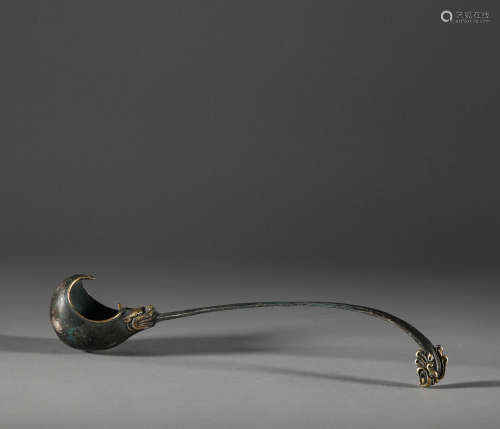 Bronze gilt spoon with animal pattern in Han Dynasty