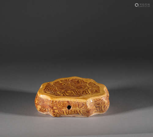 Yellow glazed pillow of Tang Dynasty
