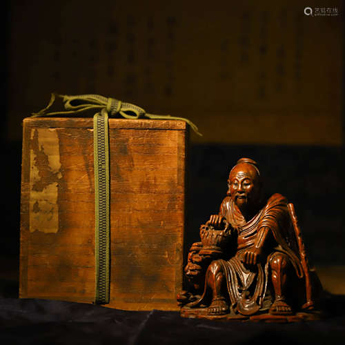 竹雕人物A BAMBOO CARVING OF THE IMMORTAL OF LONGEVITY AND BO...