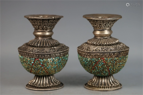 A Pair of Chinese Decorative Silver Vases