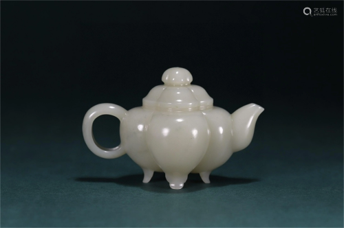 A Chinese Carved White Jade Teapot