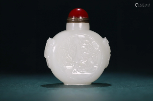 A Chinese Carved Jade Snuff Bottle With Calligraphy