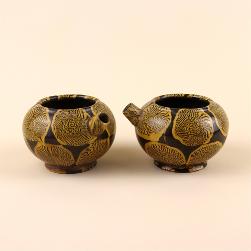 A Pair of Chinese Yellow Glazed Decorations