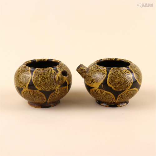 A Pair of Chinese Yellow Glazed Decorations