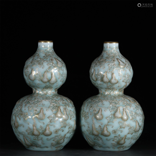 Pair of Celadon Glazed Porcelain Gourd Vases