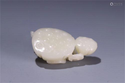 A Carved White Jade Lotus Shaped Ornament