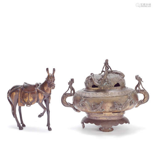 A PARCEL GILT BRONZE MULE AND A BRONZE INCENSE BURNER, COVER...