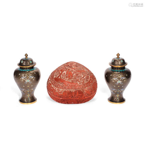 A CINNABAR LACQUER 'PEACH' BOX AND COVER AND A PAIR OF CLOIS...