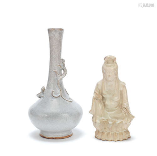 A SHIWAN CRACKLE GLAZED POTTERY MODEL OF GUANYIN AND A CRACK...