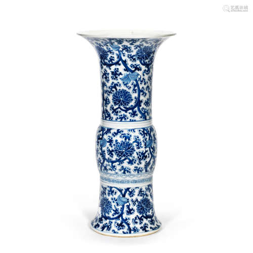 A BLUE AND WHITE 'LOTUS' BEAKER VASE, GU Late Qing Dynasty