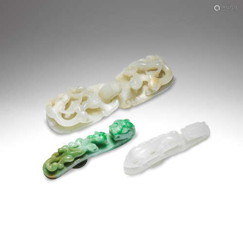 A TWO PART JADE BUCKLE, A JADEITE DRAGON BELTHOOK AND A GLAS...