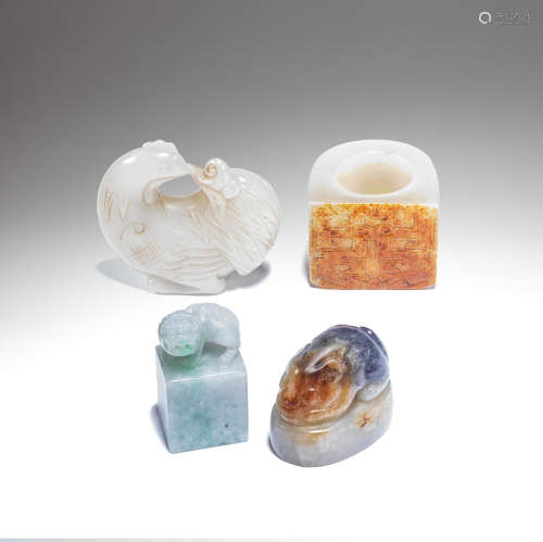 A SELECTION OF FOUR JADE AND JADEITE CARVINGS Late Qing Dyna...