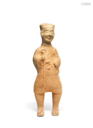 A LARGE SICHUAN-STYLE POTTERY MODEL OF A FARMER