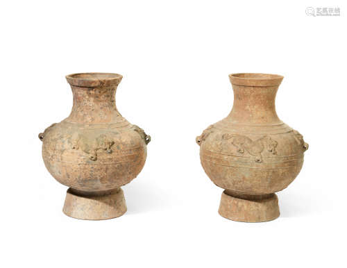 TWO LARGE RELIEF-MOULDED HAN-STYLE JARS