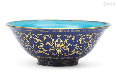 A GILT DECORATED BLUE ENAMELLED 'LOTUS' BOWL Qianlong four-c...