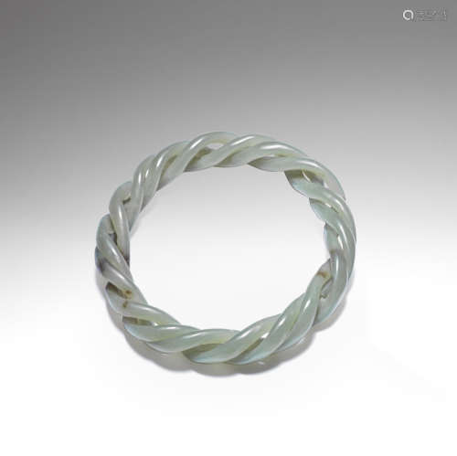 A GREEN AND MUSHROOM JADE ROPE-TWIST BANGLE Qing Dynasty