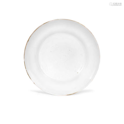 A WHITE GLAZED ANHUA DECORATED DISH 18th century