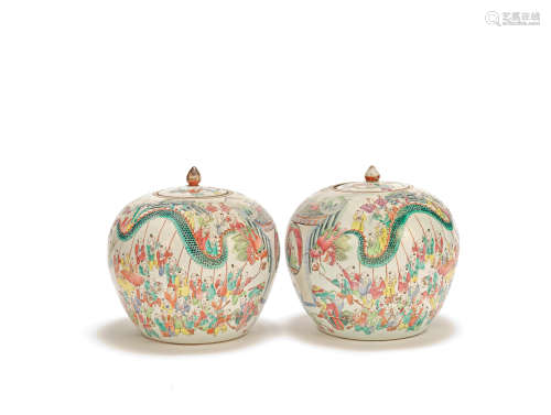 A PAIR OF FAMILLE ROSE 'BOYS' JARS AND COVERS Late Qing Dyna...