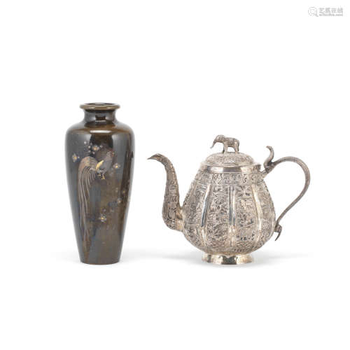 A JAPANESE INLAID METAL VASE AND AN INDIAN SILVER TEAPOT AND...