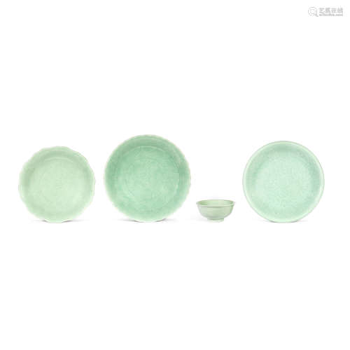THREE CELADON-GLAZED CHARGERS AND A BOWL 19th century