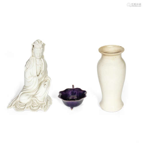 A BLANC-DE-CHINE FIGURE OF GUANYIN, A SOFT-PASTE VASE AND AN...