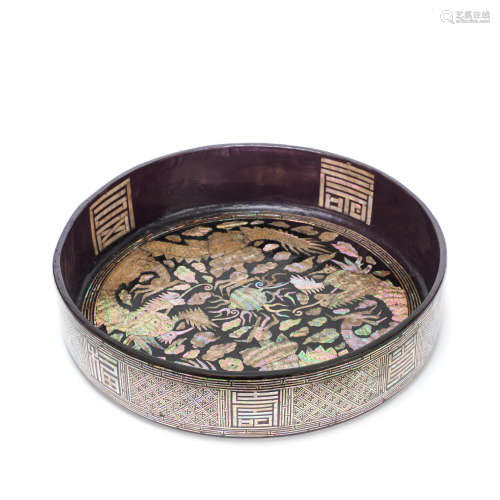 A MOTHER-OF-PEARL INLAID LACQUERED WOOD CIRCULAR TRAY Korea,...
