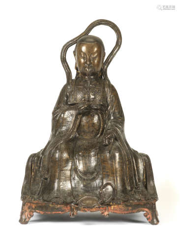 A LARGE BRONZE FIGURE OF ZHENWU 16th/17th century