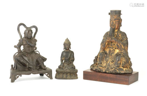 THREE BRONZE BUDDHIST AND DAOIST FIGURES Ming Dynasty
