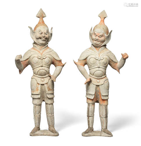 A PAIR OF LARGE PAINTED POTTERY FIGURES OF LOKAPALAS Tang Dy...